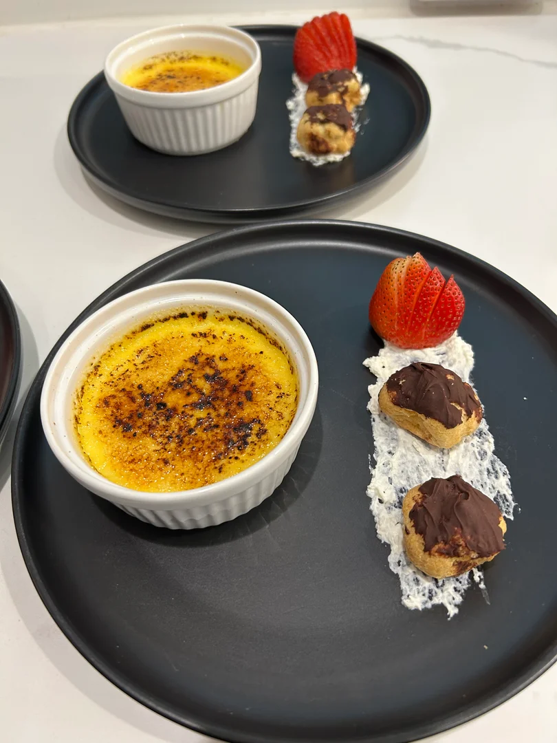 Crème Brûlée with Chocolate-Topped Profiteroles and Fresh Berries — Chef Charles Schulman